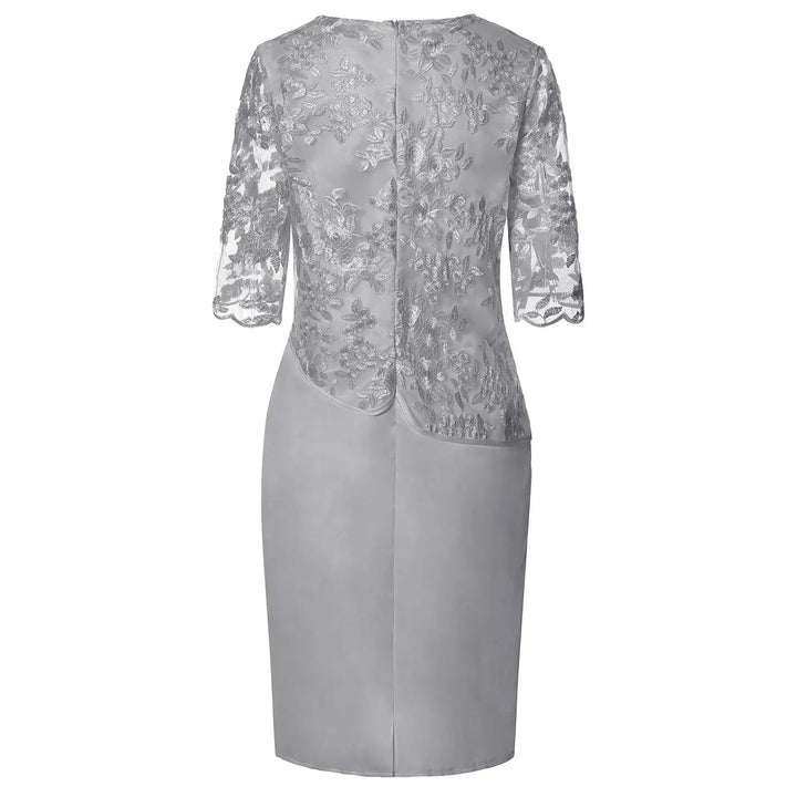 Beautiful plus size women's midi dress with three-quarter sleeves and lace overlay. Chic and elegant for any occasion.