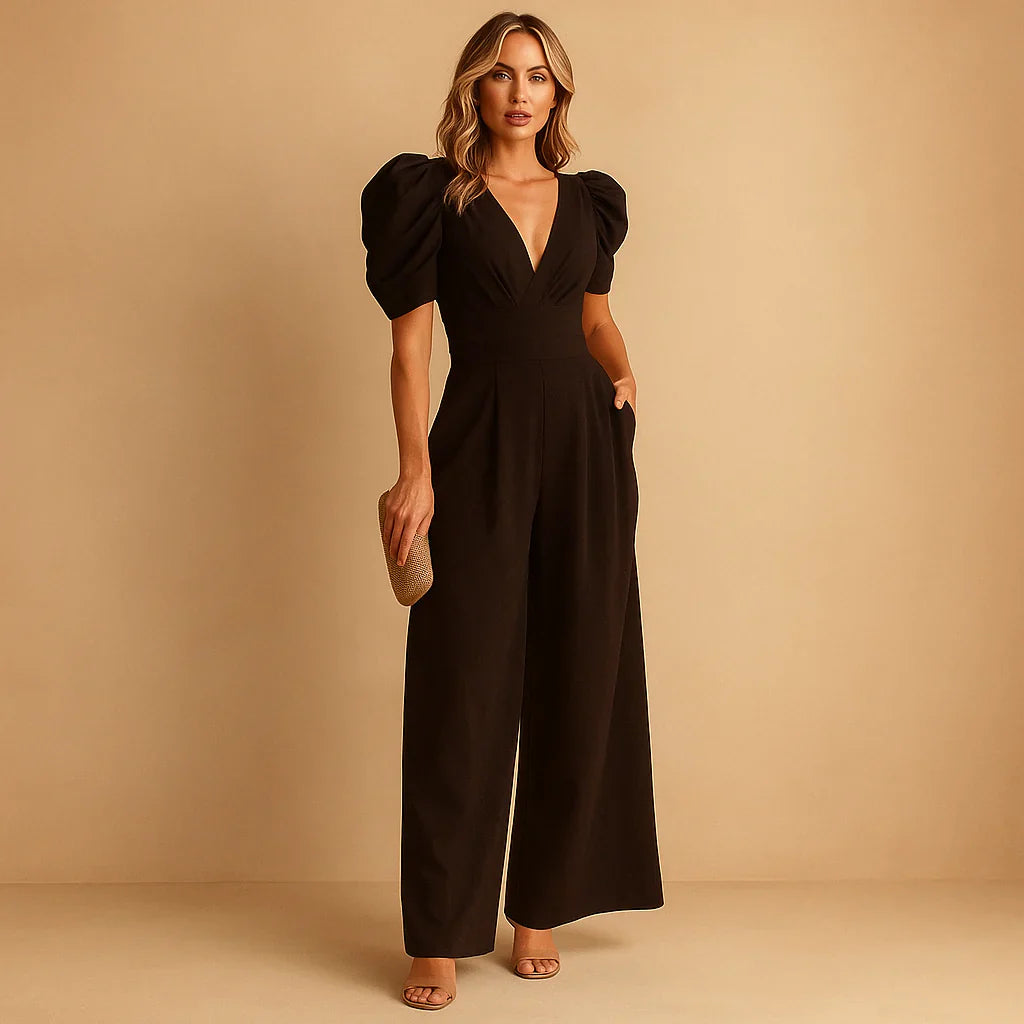 Full shot of a woman wearing a sophisticated puff sleeve jumpsuit, evening wear.