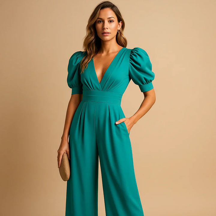 Model showcasing the tailored fit of a formal wear puff sleeve jumpsuit for women.
