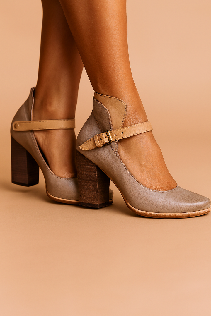 Stylish women's elegant pumps with secure strap and block heel design.
