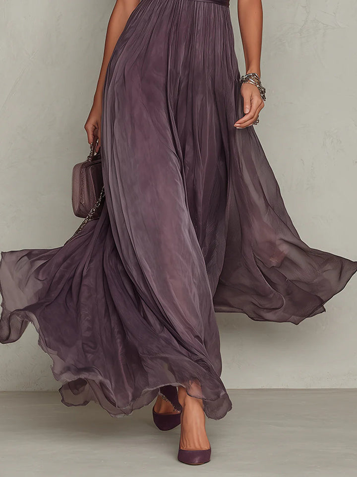 Stunning purple drop-neck long party dress for women. Elegant and chic for any special event.