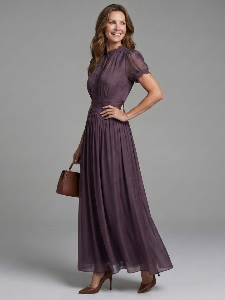 Flowy purple maxi dress for women with keyhole neckline & gathered waist. Comfortable short-sleeve style for day or evening.