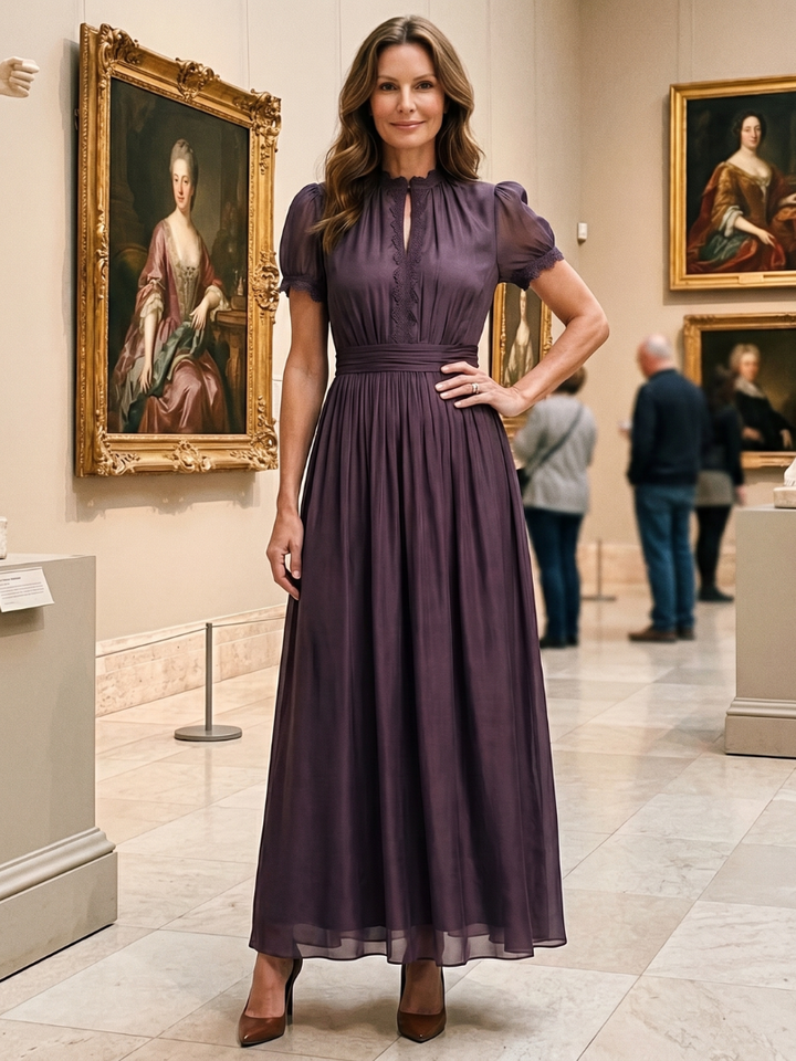 Elegant purple women's maxi dress. Keyhole neckline & gathered waist enhance its flowy, short-sleeve design for evenings.