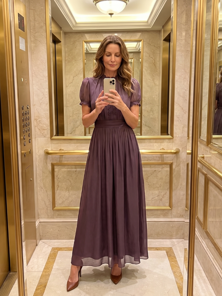 Women's purple maxi dress with an elegant keyhole neckline, gathered waist, and short sleeves. Comfortable & versatile.