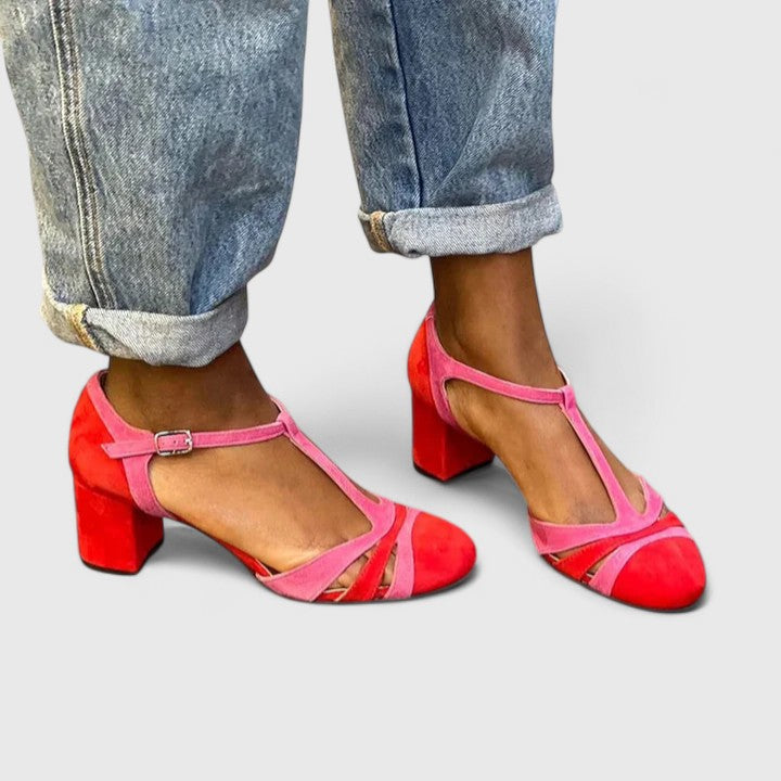 Supportive red women's heels with arch support. Stylish orthopaedic footwear for office or elegant all-day comfort.