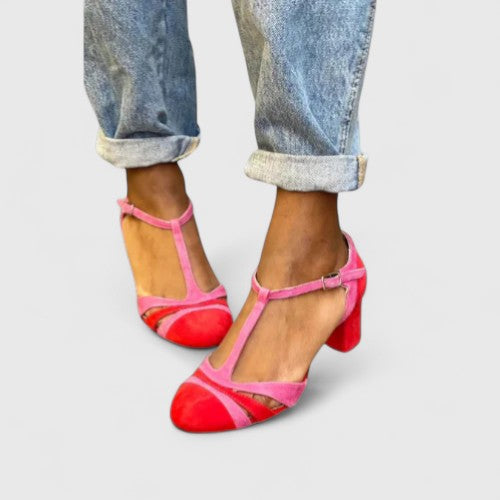 Red women's orthopaedic heels offering elegant style & all-day comfort with crucial arch support. Ideal for work.