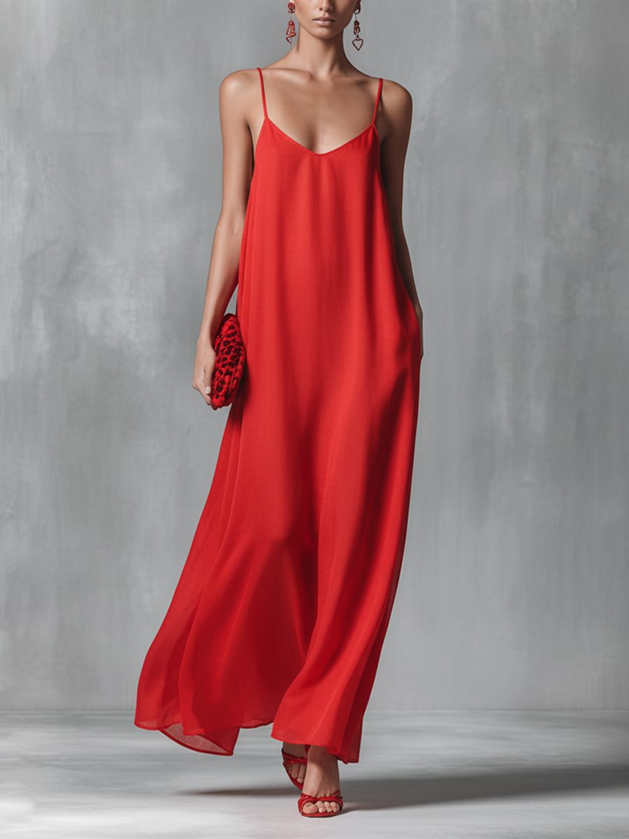 Elegant red V-neck spaghetti strap maxi dress for women. Flowing design, perfect for summer evenings, holidays, or resort wear.