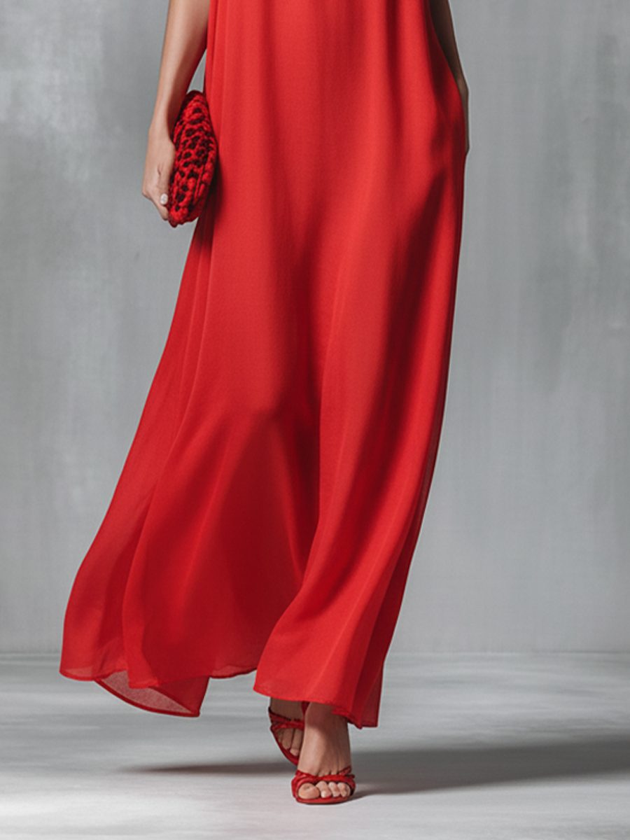 Beautiful women's V-neck spaghetti strap maxi dress, an elegant holiday outfit or comfortable beach resort wear.