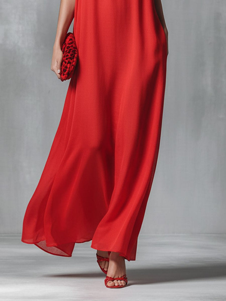 Beautiful women's V-neck spaghetti strap maxi dress, an elegant holiday outfit or comfortable beach resort wear.