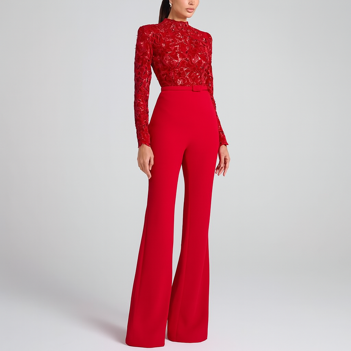 Sophisticated red embroidered jumpsuit for women. Features wide flared legs & a belted waist, perfect for special occasions.