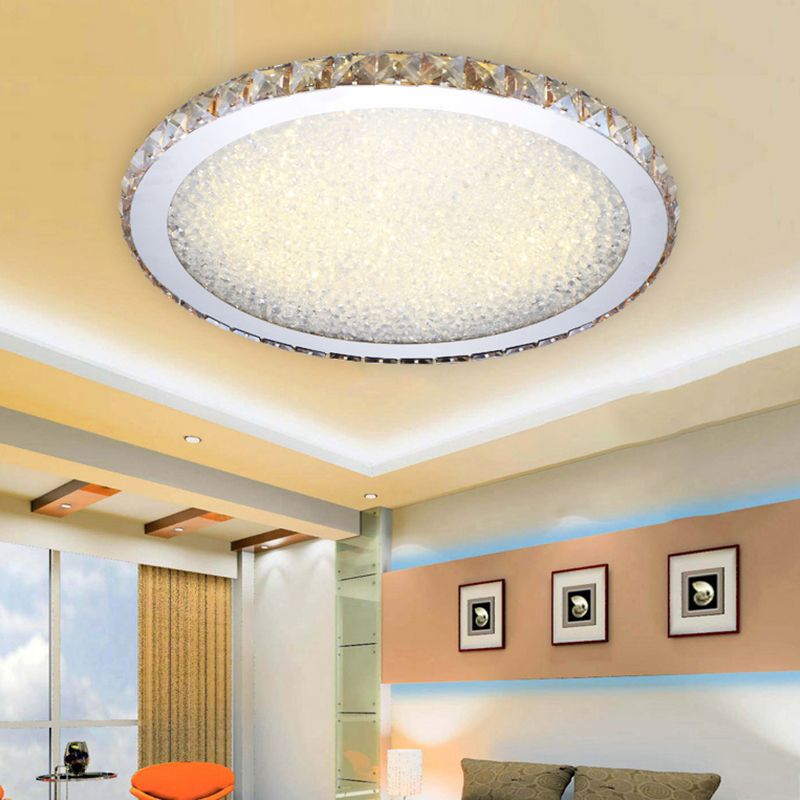 Sleek round crystal LED flush mount ceiling fixture. Elegant and modern decorative light, ideal for low ceilings.