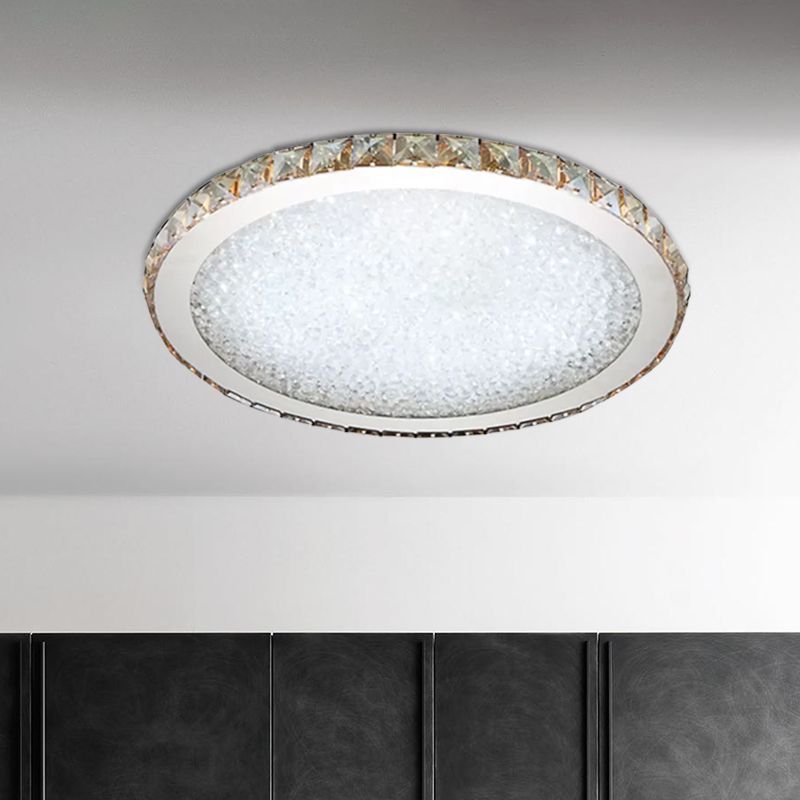 Glamorous round crystal LED flush mount ceiling light. Modern, energy-efficient lighting for stylish bedrooms & living rooms.