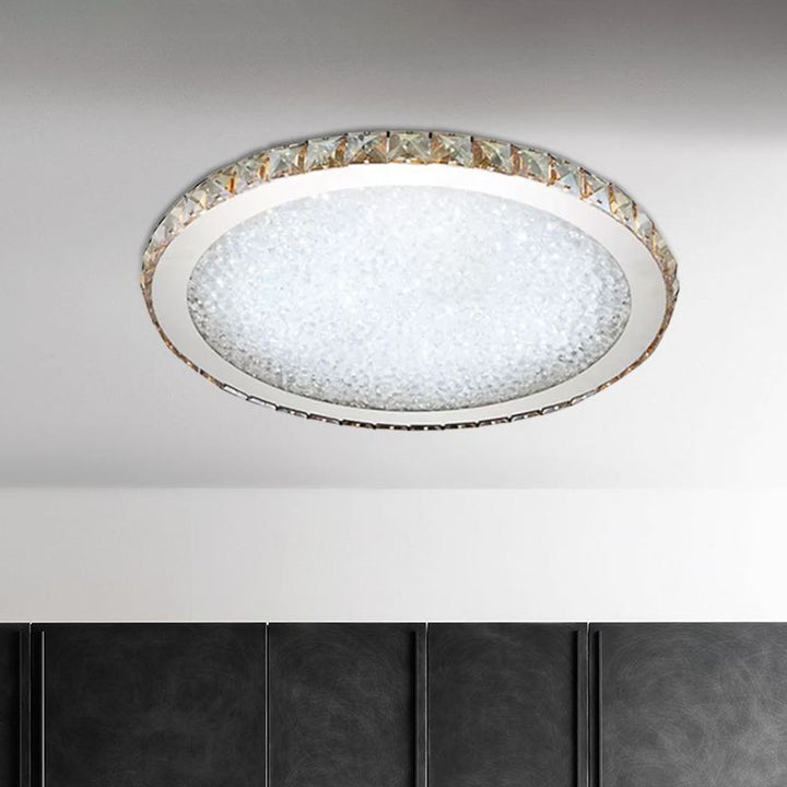Glamorous round crystal LED flush mount ceiling light. Modern, energy-efficient lighting for stylish bedrooms & living rooms.