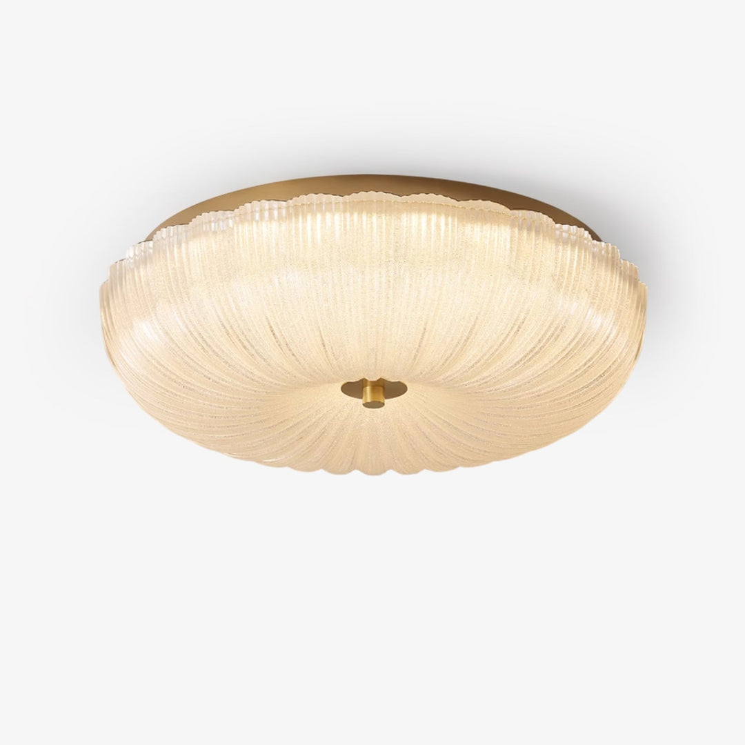 Elegant round flush mount ceiling light with rippled glass shade, perfect for modern homes.