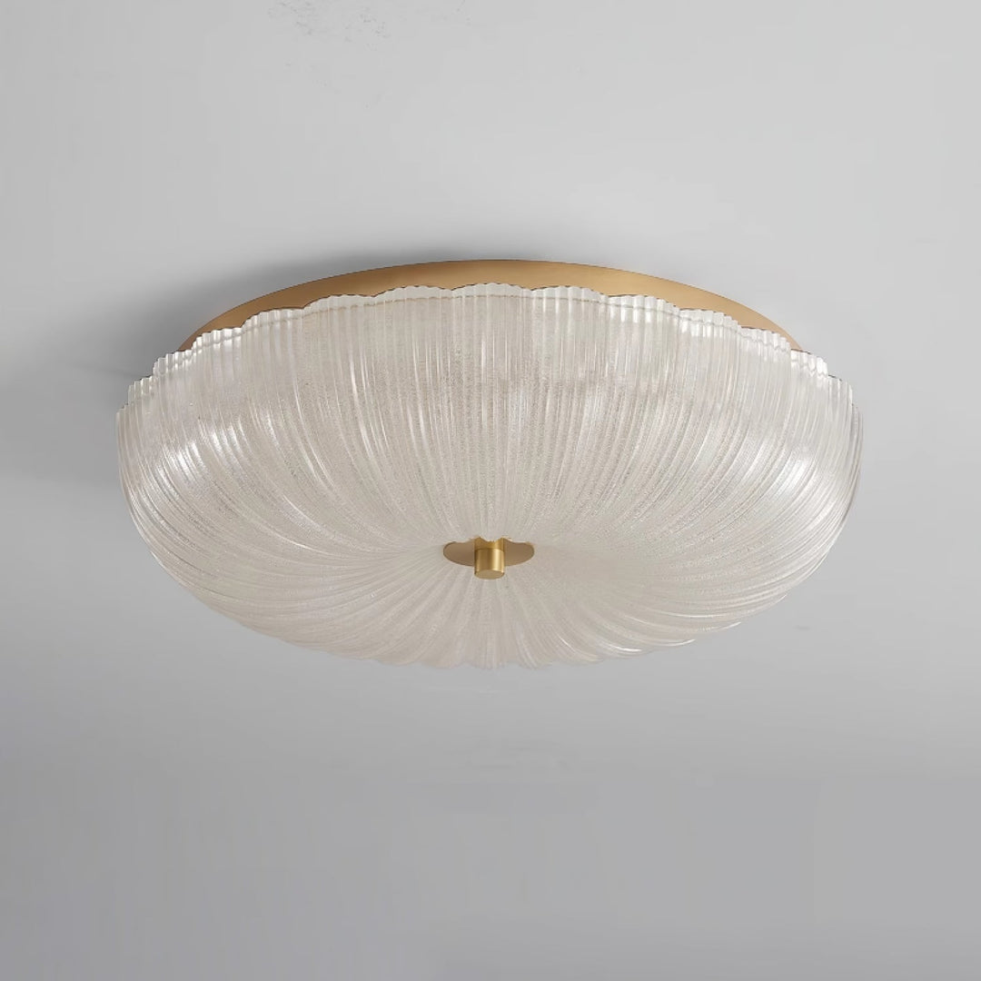 Bright LED round flush mount ceiling light, elegant rippled glass, illuminates modern homes.