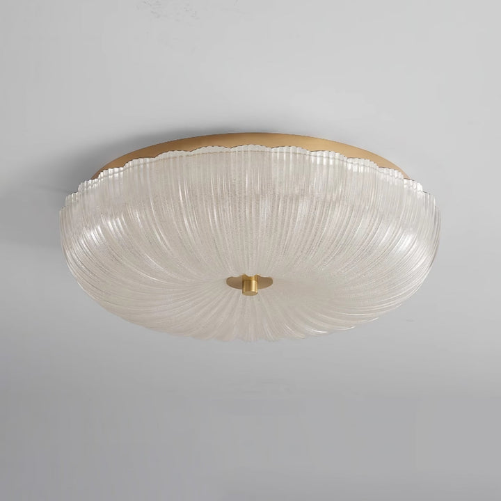Bright LED round flush mount ceiling light, elegant rippled glass, illuminates modern homes.