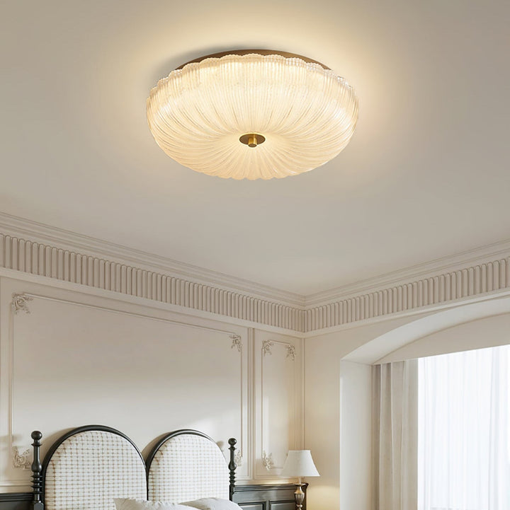 LED flush mount ceiling light, round with rippled glass, offering adjustable illumination.