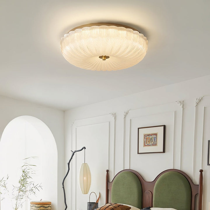 Indoor round flush mount ceiling light, elegant rippled glass, suits living rooms & hallways.