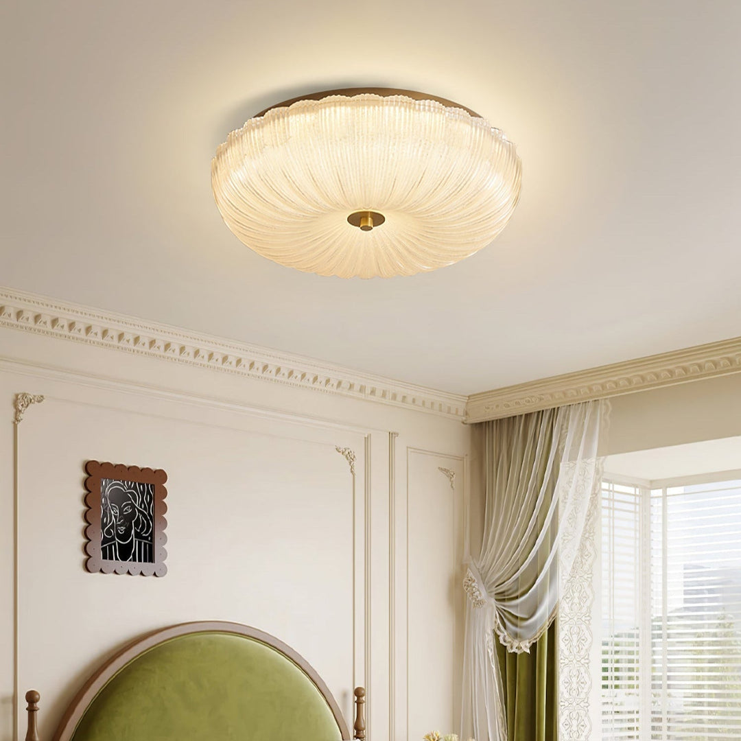 Contemporary round flush mount ceiling light, rippled glass, enhances modern home decor.
