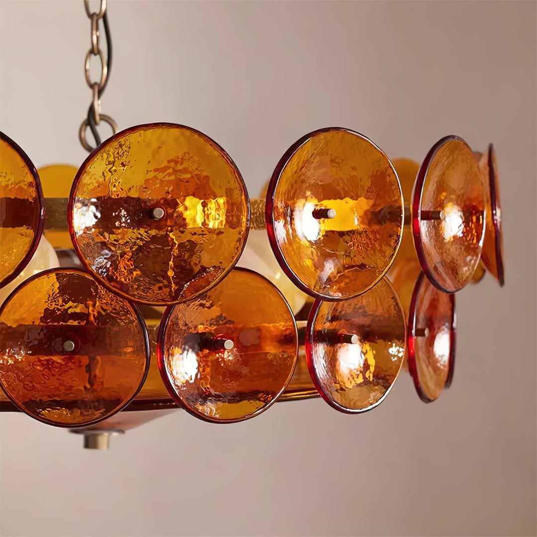 Minimalist round glass chandelier design, offering understated elegance.