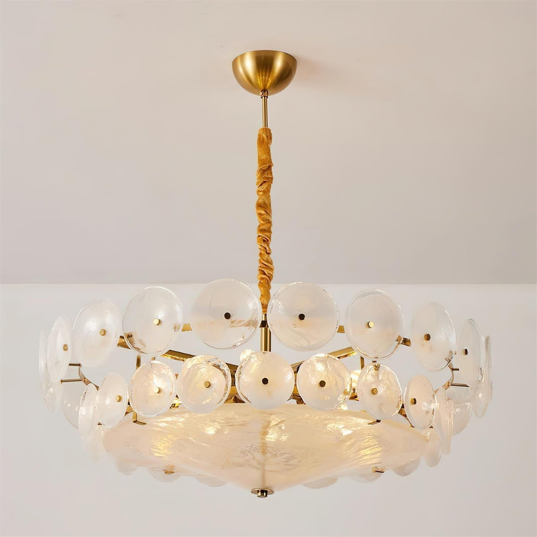 View from below of a magnificent round glass and metal ceiling chandelier.