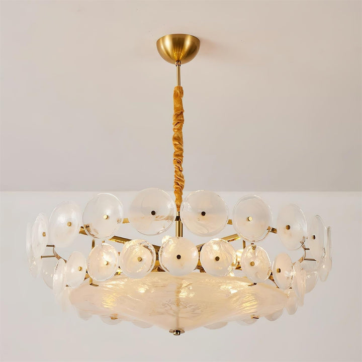 View from below of a magnificent round glass and metal ceiling chandelier.