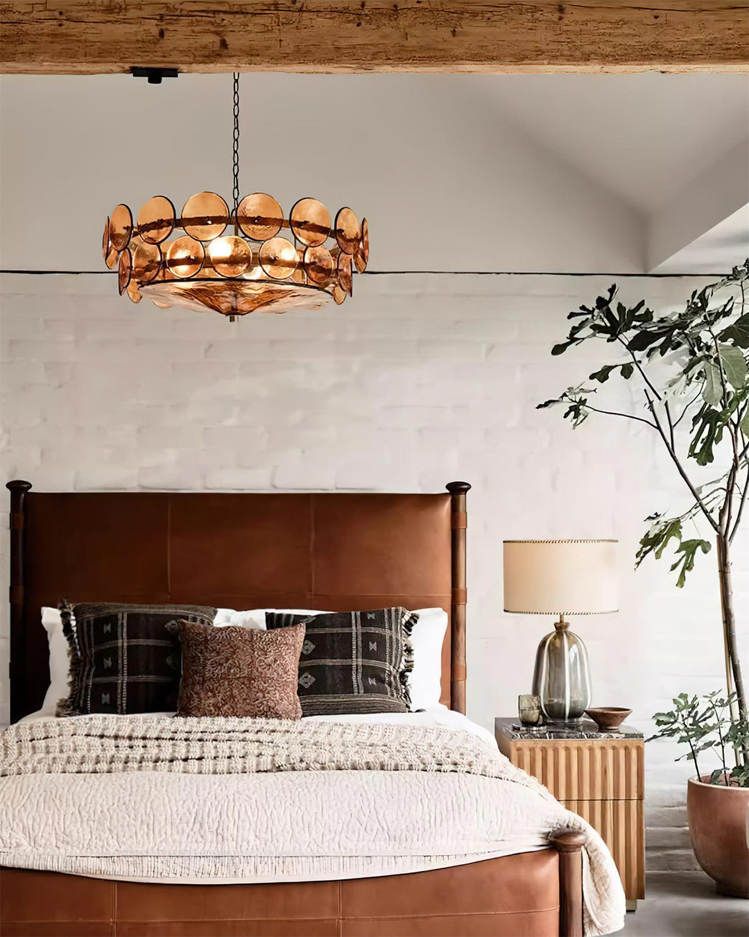 Large round glass & metal chandelier, a bold statement piece for elegant rooms.