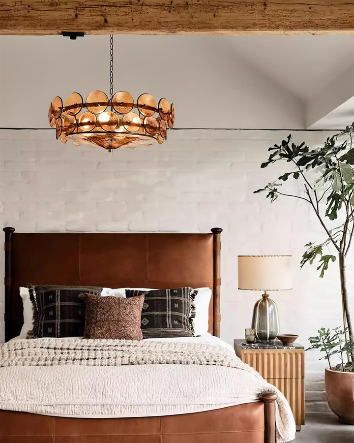 Large round glass & metal chandelier, a bold statement piece for elegant rooms.
