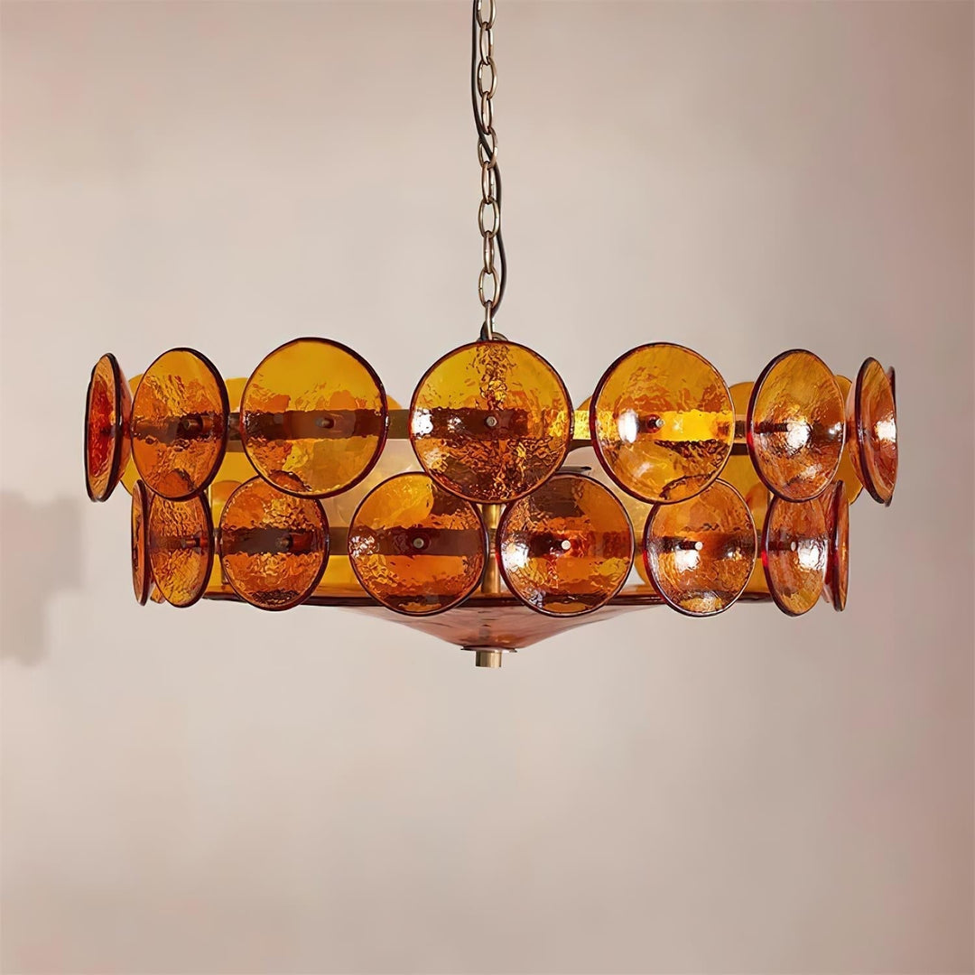 Architectural round glass & metal chandelier, enhancing modern interior design.