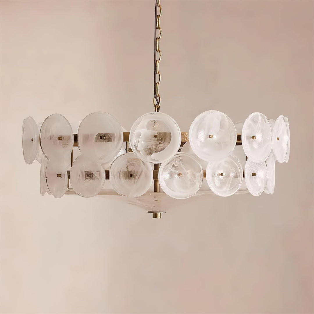 Modern round ceiling light fixture with glass shades & metal frame.