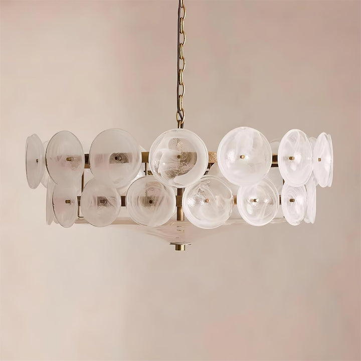 Modern round ceiling light fixture with glass shades & metal frame.