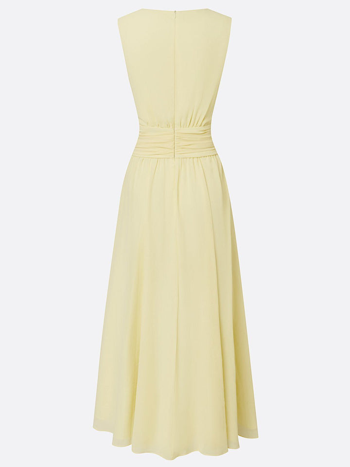 Long elegant maxi dress, sleeveless, ruched, for wedding guests.