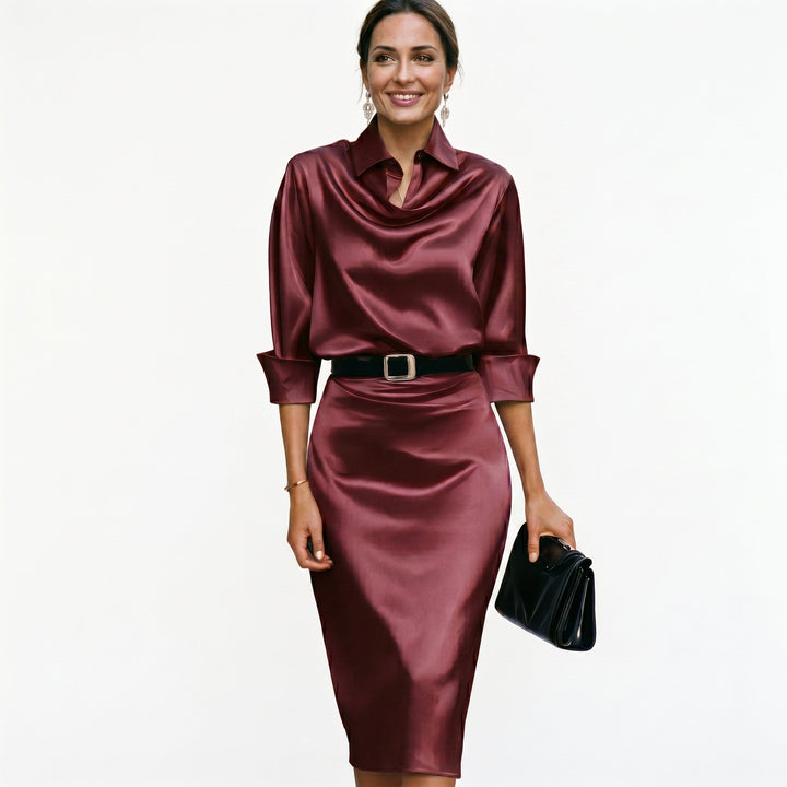 Elegant satin midi dress in a classic silhouette, perfect for wedding guests.