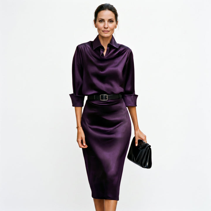 Sophisticated midi length satin dress, designed for elegant evening wear.