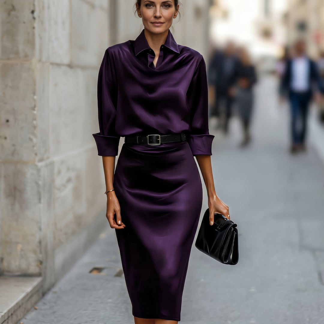 The ultimate wedding guest attire: a stunning satin midi dress.