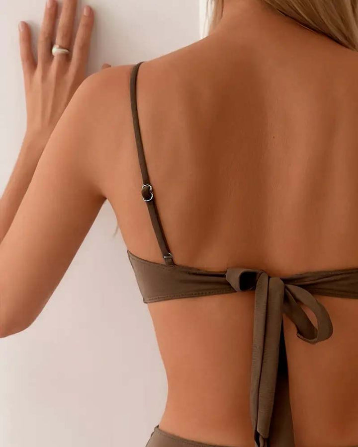 Women's elegant sculpted two-piece bikini, flattering fit for beach and resort wear.