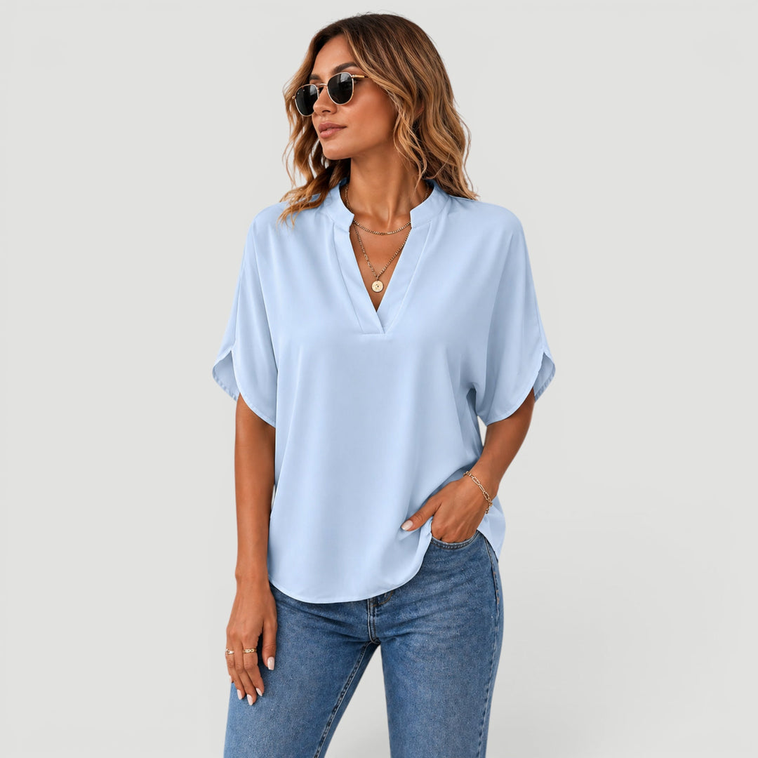 Elegant short sleeve blouse for women, perfect for office or casual chic everyday wear.
