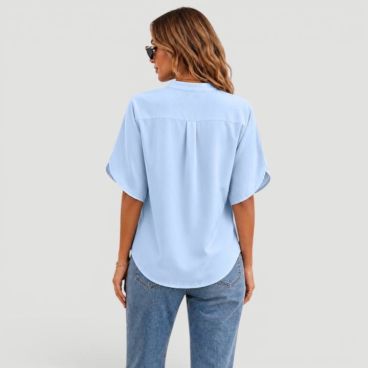 Versatile women's short sleeve blouse, comfortable & stylish for summer or office fashion.