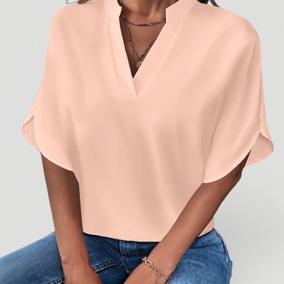 Casual chic short sleeve blouse, comfortable ladies apparel for versatile everyday wear.