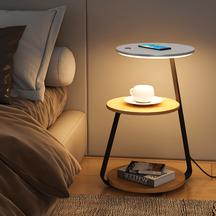 Contemporary end table, stone top & lower tier storage, enhancing modern home decor.
