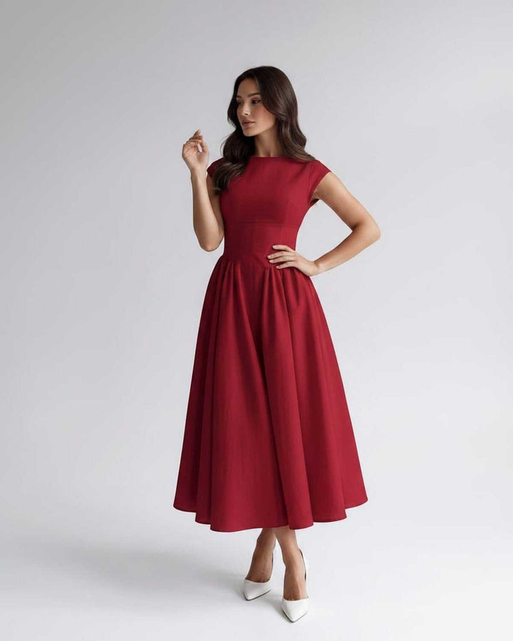 Flattering sleeveless A-line midi dress for women, elegant design with a gathered waist, formal.