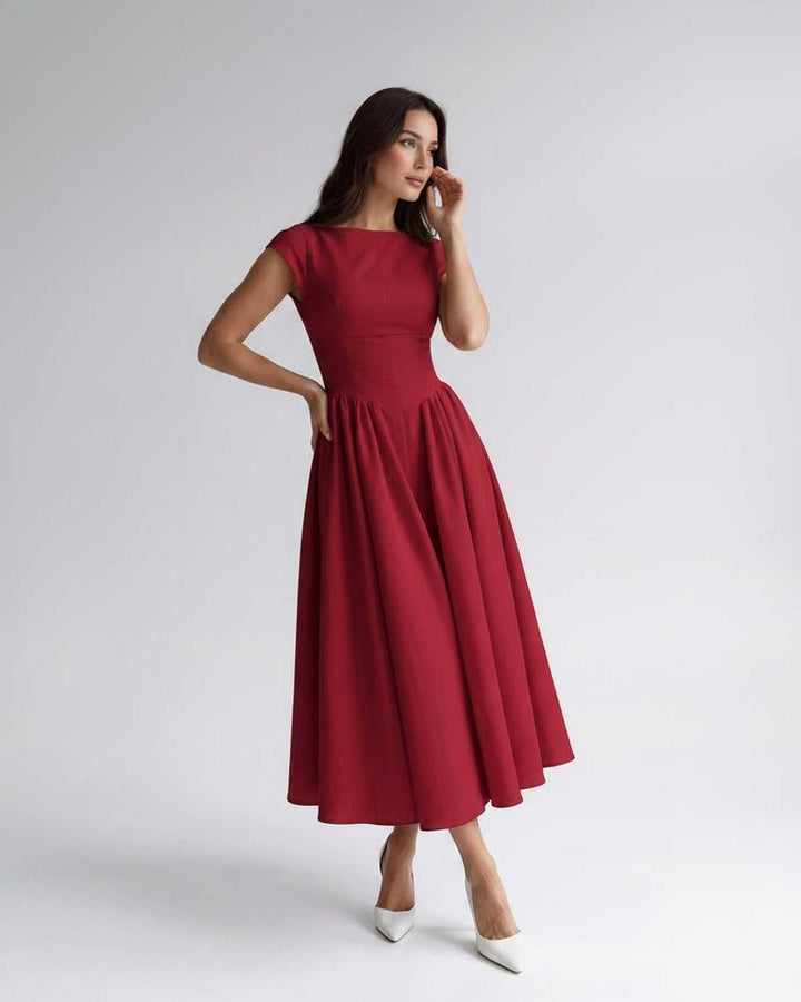 Women's occasion wear: elegant sleeveless A-line midi dress, perfect for evening parties.