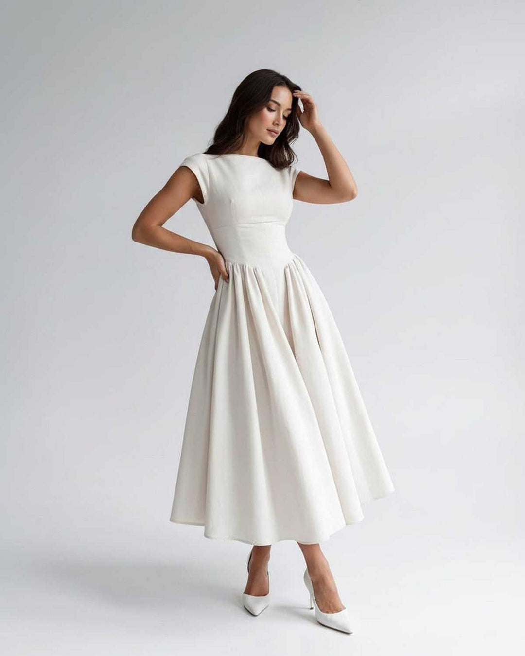Women's chic sleeveless A-line midi dress, a sophisticated choice for formal occasions & parties.
