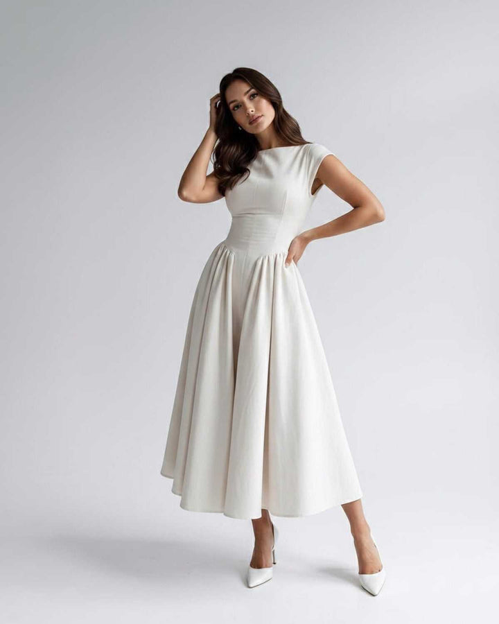 Sophisticated sleeveless A-line midi dress for women, ideal for evening wear & formal gatherings.