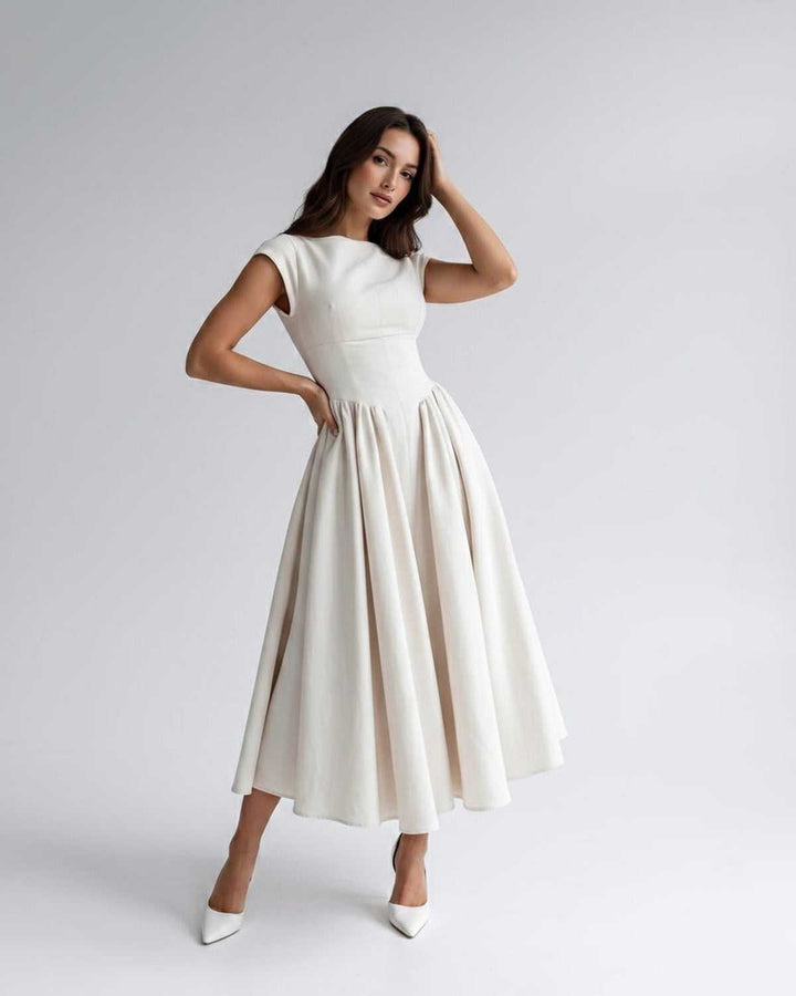 Elegant women's sleeveless A-line midi dress with a flattering silhouette and a gathered waist.