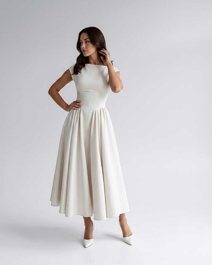 Chic women's sleeveless A-line midi dress, versatile for formal or party occasions, elegant.