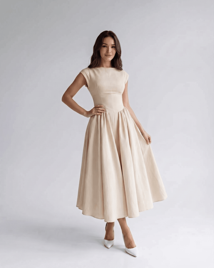 Chic women's sleeveless A-line midi dress, ideal for evening parties or formal occasion wear.
