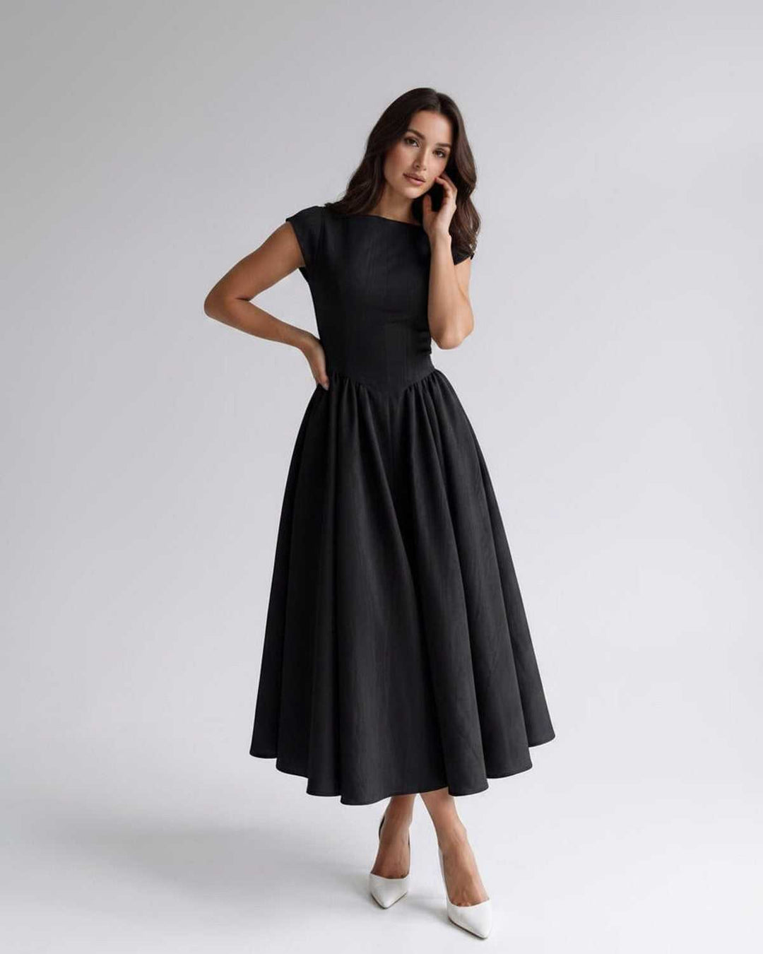 Flattering gathered waist sleeveless A-line midi dress for women, an elegant formal option.