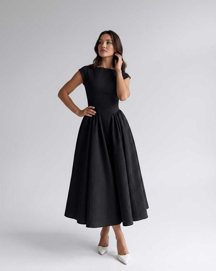 Chic sleeveless A-line midi dress for women, an elegant choice for parties and formal gatherings.