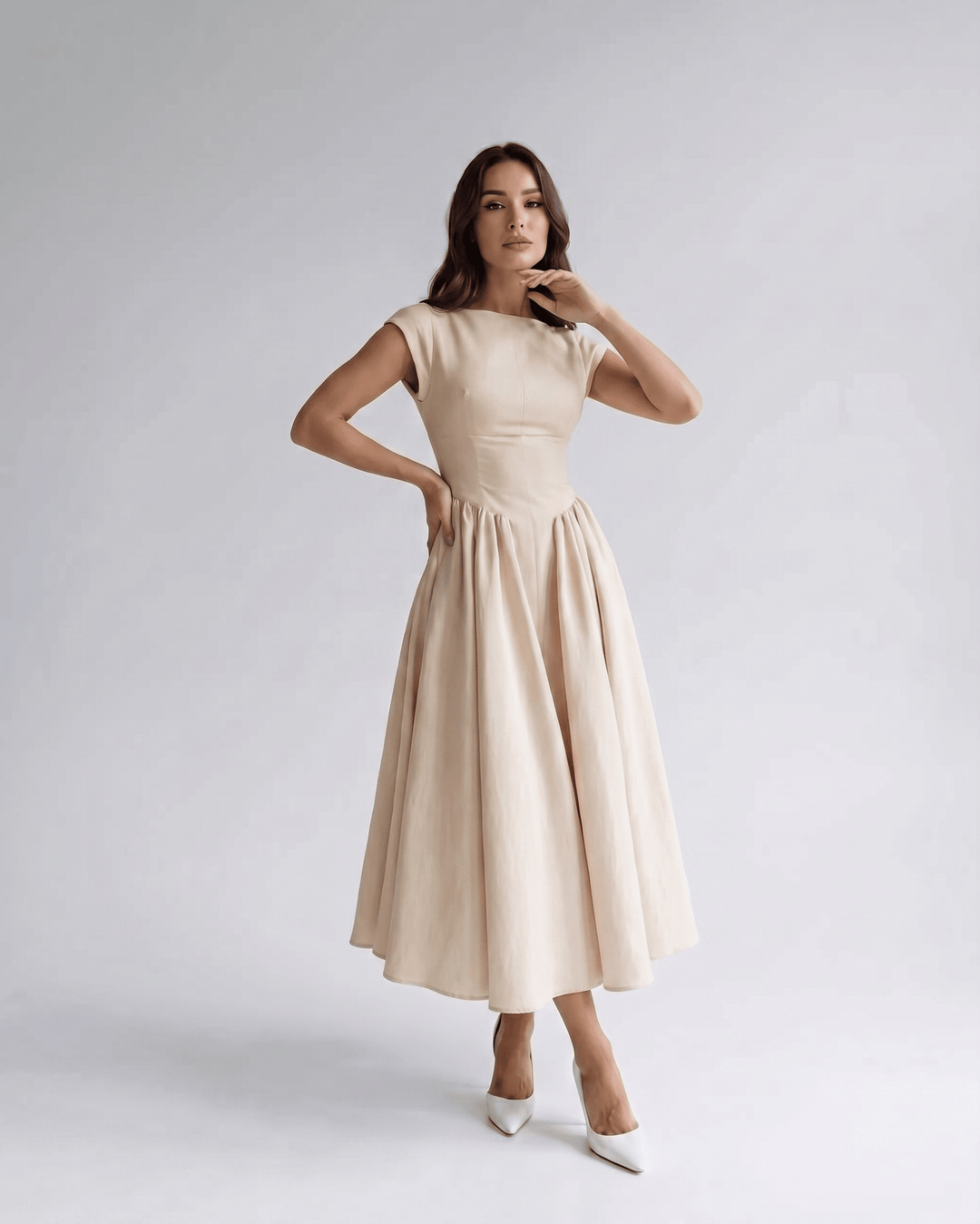 Formal women's sleeveless A-line midi dress, sophisticated & elegant, suitable for special occasions.